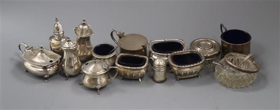 Thirteen assorted silver condiments including mustard pots, pepperettes etc and a silver mounted toilet jar.